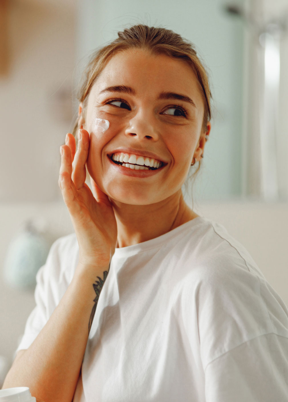 a woman smiling for the camera